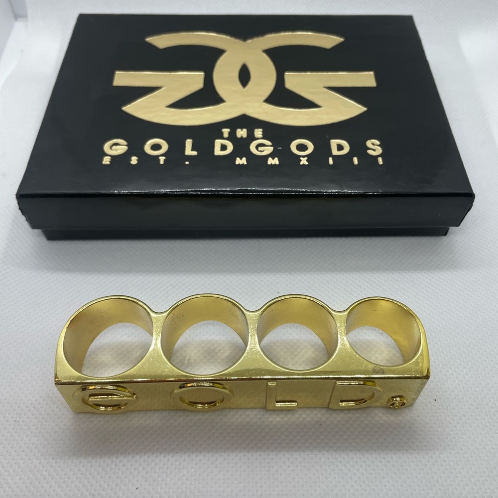 The Gold Gods Gold Wheels Four Finger Ring